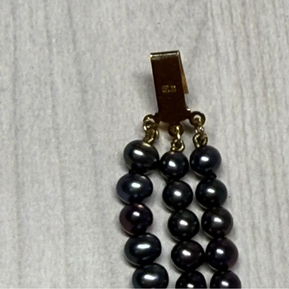 14k Yellow Gold Elegant Black Natural Multi-Strand Pearl Bracelet.